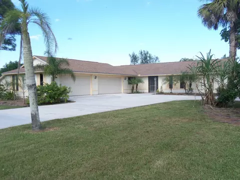 8769 SW Tropical Ave, Stuart, FL 34997 photo 1