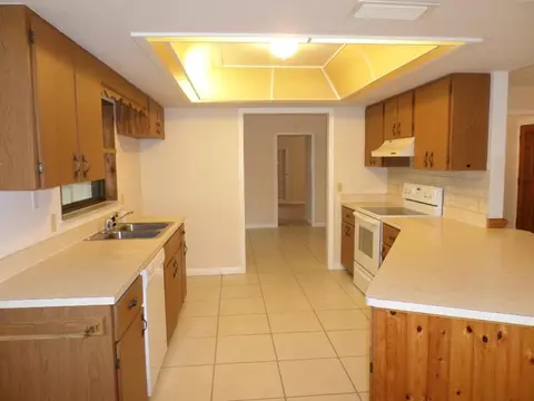 8769 SW Tropical Ave, Stuart, FL 34997 photo 3