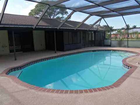 8769 SW Tropical Ave, Stuart, FL 34997 photo 2