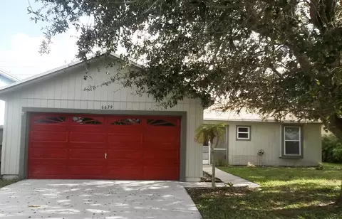 6679 SE Raintree Ave, Stuart, FL 34997 photo 1