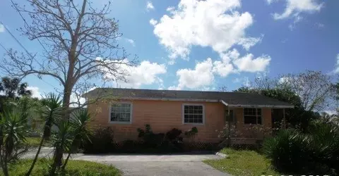 5554 SE Geraldine St, Stuart, FL 34997 photo 1