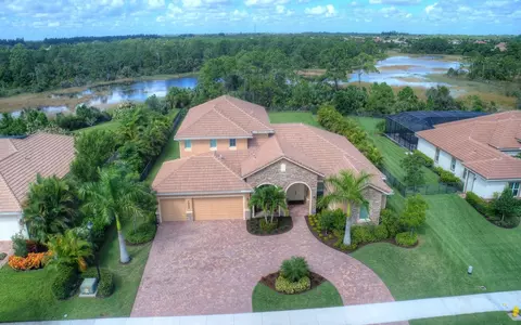 7590 SE Ravissant Dr, Stuart, FL 34997 photo 1