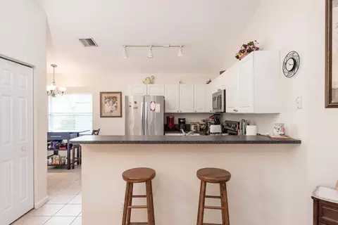 8950 SW Chrysler Cir SW, Stuart, FL 34997 photo 9