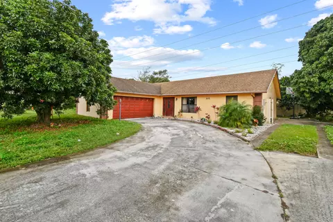 301 Canterbury Dr W, Riviera Beach, FL 33407