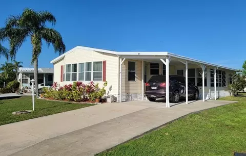 611 Hyacinth Cir, Barefoot Bay, FL 32976