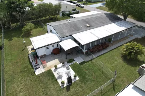 604 Amaryllis Dr, Barefoot Bay, FL 32976