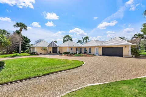 261 N Country Club Dr, Atlantis, FL 33462