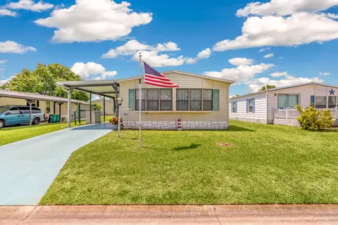 495 Dolphin Cir, Barefoot Bay, FL 32976