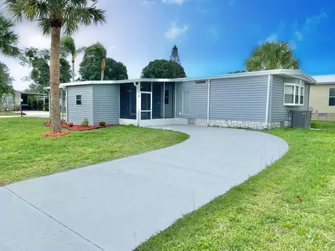 1038 Warbler Ct, Barefoot Bay, FL 32976
