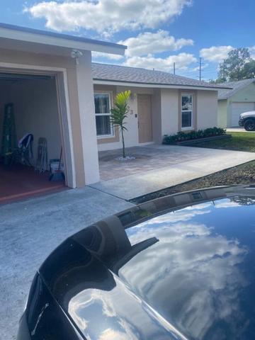 123 Raven Ct NW, Royal Palm Beach, FL 33411