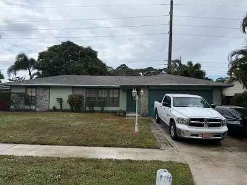203 Canterbury Dr W, Riviera Beach, FL 33407