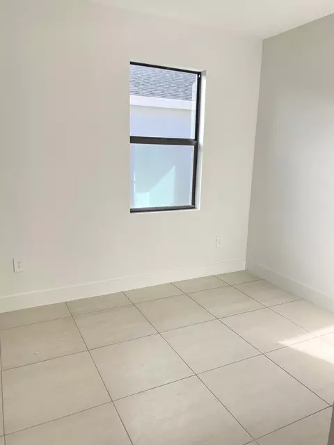 Bedroom - 6950 SE Park Trace Dr, Stuart, FL 34997 photo 1 of 3