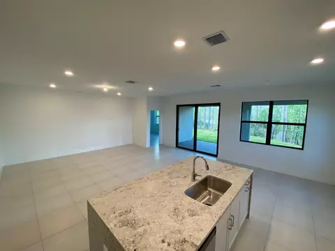 Living - 6950 SE Park Trace Dr, Stuart, FL 34997 photo 2 of 2