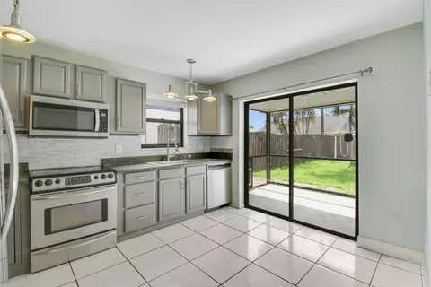 Kitchen - 5929 SE Collins Ave, Stuart, FL 34997 photo 2 of 3