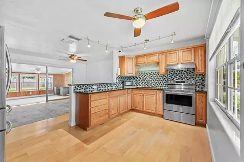 Kitchen - 5709 SE Indigo Ave, Stuart, FL 34997 photo 1 of 2