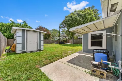 Exterior - 5709 SE Indigo Ave, Stuart, FL 34997 photo 4 of 5