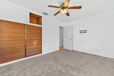 Bedroom - 5709 SE Indigo Ave, Stuart, FL 34997 photo 2 of 4