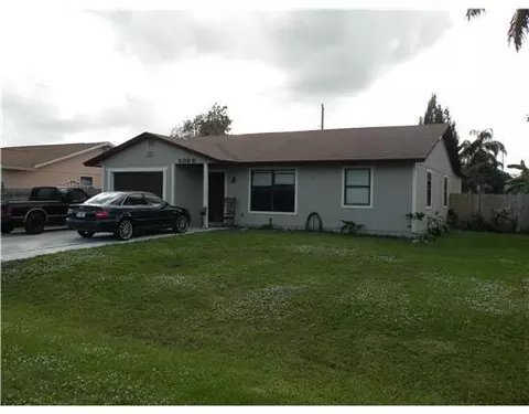 5866 Rosemont St, Stuart, FL 34997 photo 1
