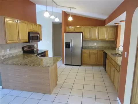 4008 SE Jacaranda St, Stuart, FL 34997 photo 3