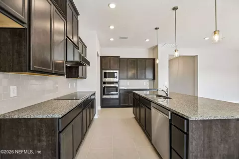 Kitchen - 85417 Sandy Ridge Loop #0084, Yulee, FL 32097 photo 2 of 2