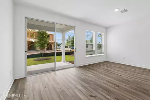 Living - 693 Windchime St, Yulee, FL 32097 photo 4 of 7