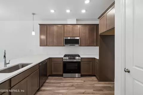 Kitchen - 693 Windchime St, Yulee, FL 32097 photo 2 of 2