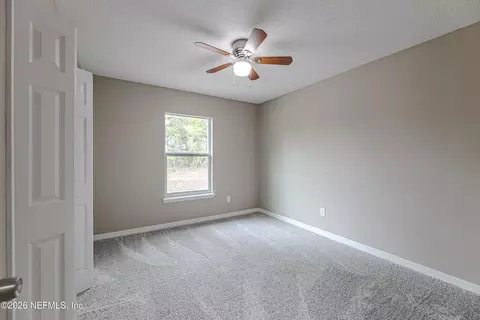 Bedroom - 67104 Elnora Ln, Yulee, FL 32097 photo 7 of 10