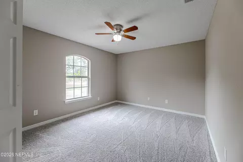 Bedroom - 67104 Elnora Ln, Yulee, FL 32097 photo 5 of 10