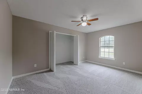 Bedroom - 67104 Elnora Ln, Yulee, FL 32097 photo 3 of 10
