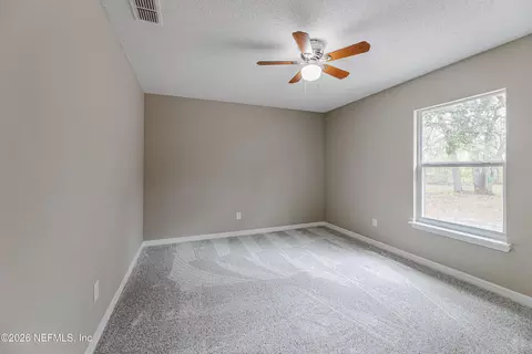 Bedroom - 67104 Elnora Ln, Yulee, FL 32097 photo 9 of 10