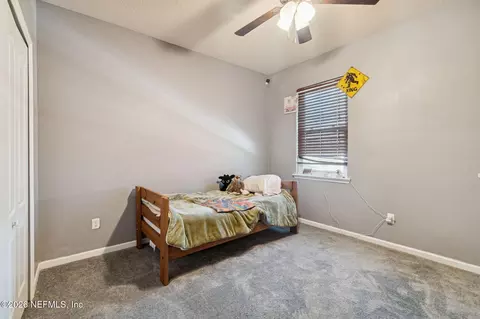 Bedroom - 13687 Devan Lee Dr N, Jacksonville, FL 32226 photo 9 of 17