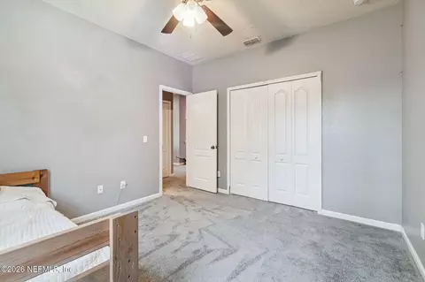 Bedroom - 13687 Devan Lee Dr N, Jacksonville, FL 32226 photo 14 of 17