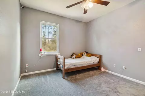 Bedroom - 13687 Devan Lee Dr N, Jacksonville, FL 32226 photo 13 of 17