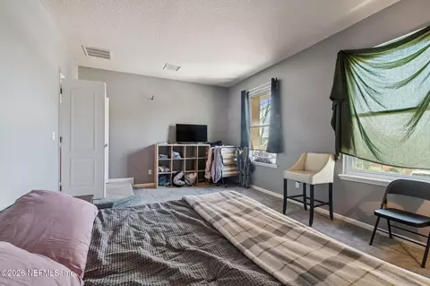Bedroom - 13687 Devan Lee Dr N, Jacksonville, FL 32226 photo 8 of 17