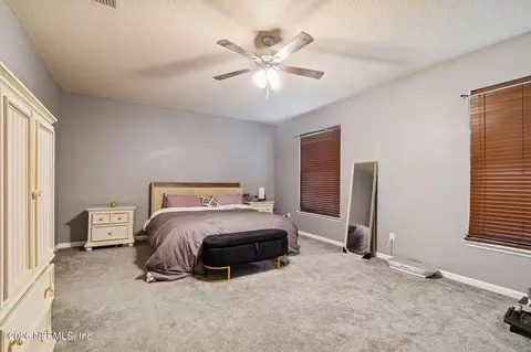 Bedroom - 13687 Devan Lee Dr N, Jacksonville, FL 32226 photo 15 of 17