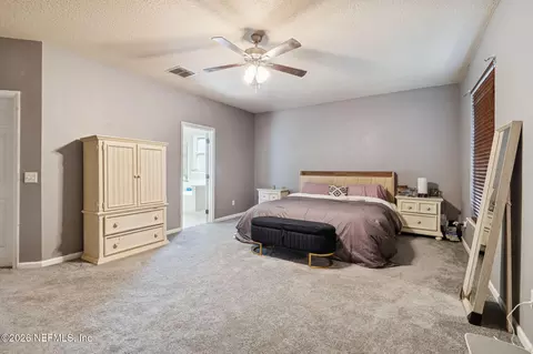 Bedroom - 13687 Devan Lee Dr N, Jacksonville, FL 32226 photo 16 of 17