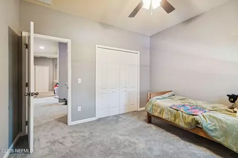 Bedroom - 13687 Devan Lee Dr N, Jacksonville, FL 32226 photo 10 of 17
