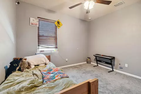 Bedroom - 13687 Devan Lee Dr N, Jacksonville, FL 32226 photo 11 of 17