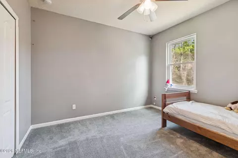 Bedroom - 13687 Devan Lee Dr N, Jacksonville, FL 32226 photo 12 of 17
