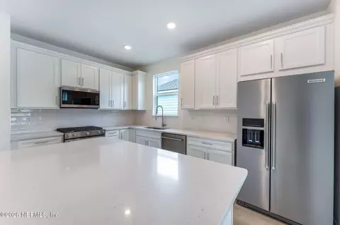 Kitchen - 401 Tranquil Trail Cir, Yulee, FL 32097 photo 3 of 5