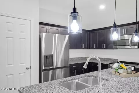 Kitchen - 407 Rustic Rd, Satsuma, FL 32189 photo 3 of 4