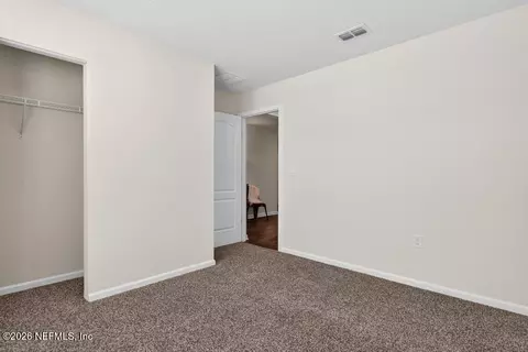 Bedroom - 75644 Bridgewater Dr, Yulee, FL 32097 photo 8 of 9