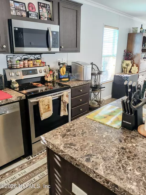 Kitchen - 137 Lewis St, Edgewater, FL 32141 photo 3 of 5