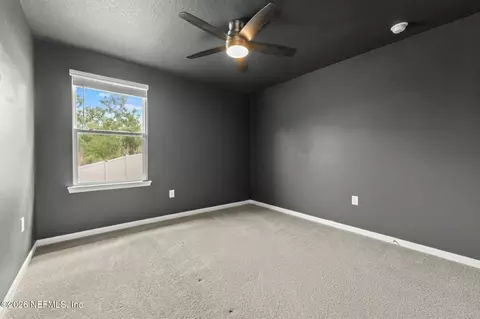 Bedroom - 66132 Edgewater Dr, Yulee, FL 32097 photo 5 of 6