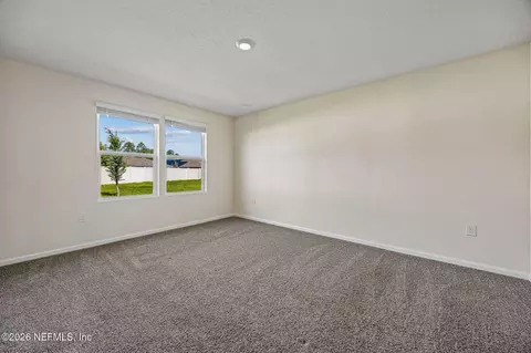 Living - 65355 Clearwater Ct, Yulee, FL 32097 photo 6 of 7