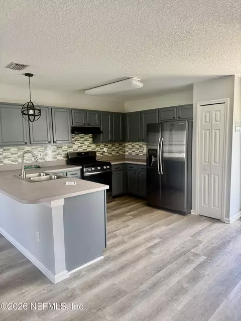Kitchen - 437 N Boulevard Blvd E, Macclenny, FL 32063 photo 1 of 4