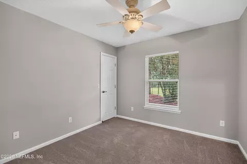 Bedroom - 1955 Guarded Way, Fleming Island, FL 32003 photo 11 of 13