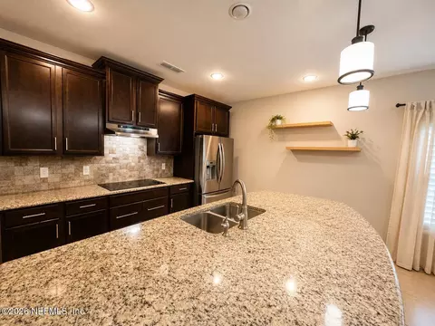 Kitchen - 82088 Chickadee Ln, Yulee, FL 32097 photo 1 of 2