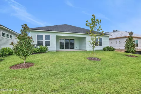 Exterior - 48 Ribera Dr, Flagler Beach, FL 32136 photo 4 of 7