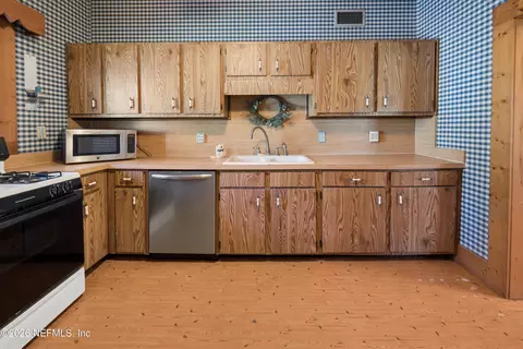 Kitchen - 403 S Cherry St, Starke, FL 32091 photo 2 of 3